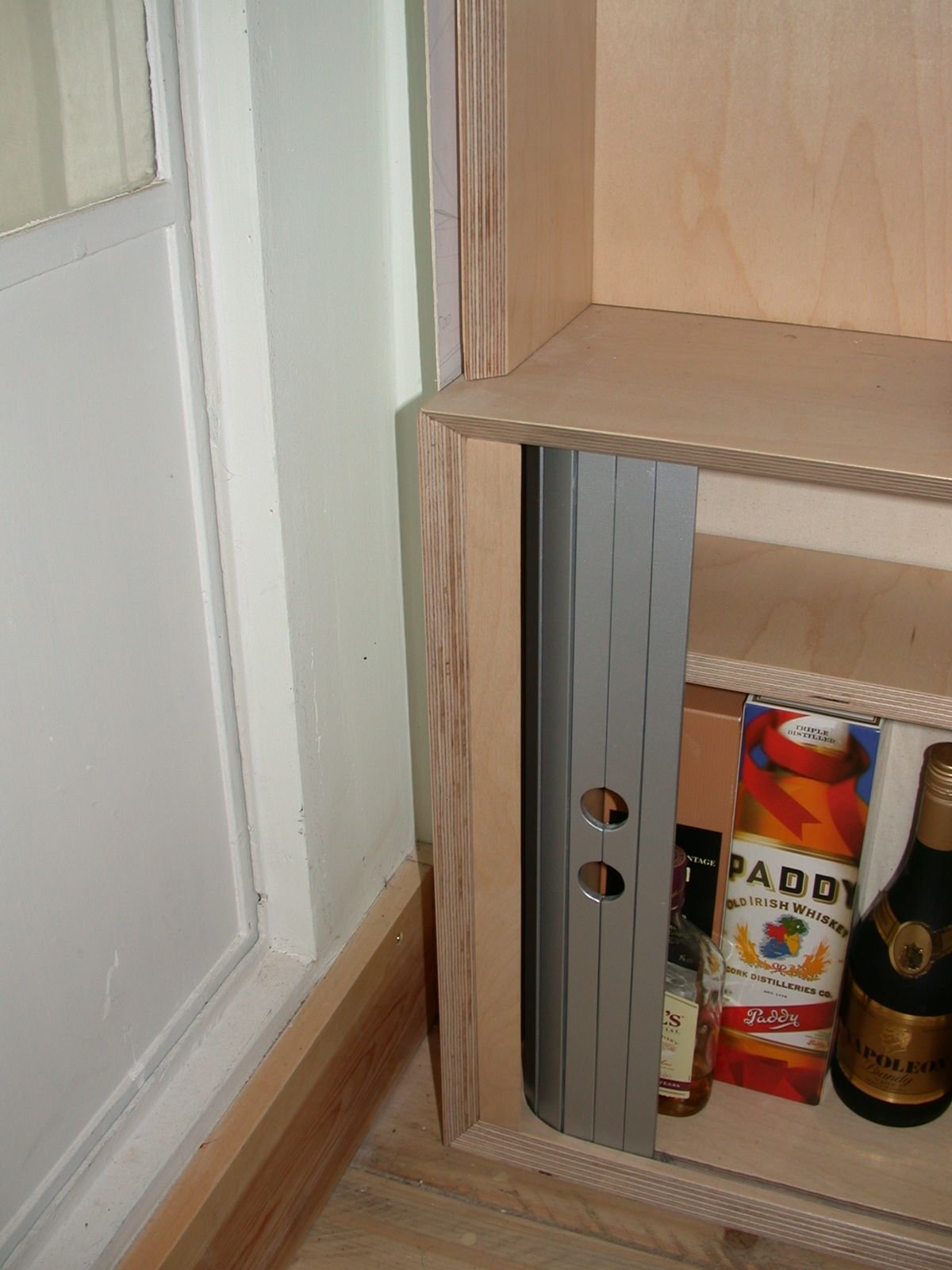 Silver tambour door rolled open showing the storage