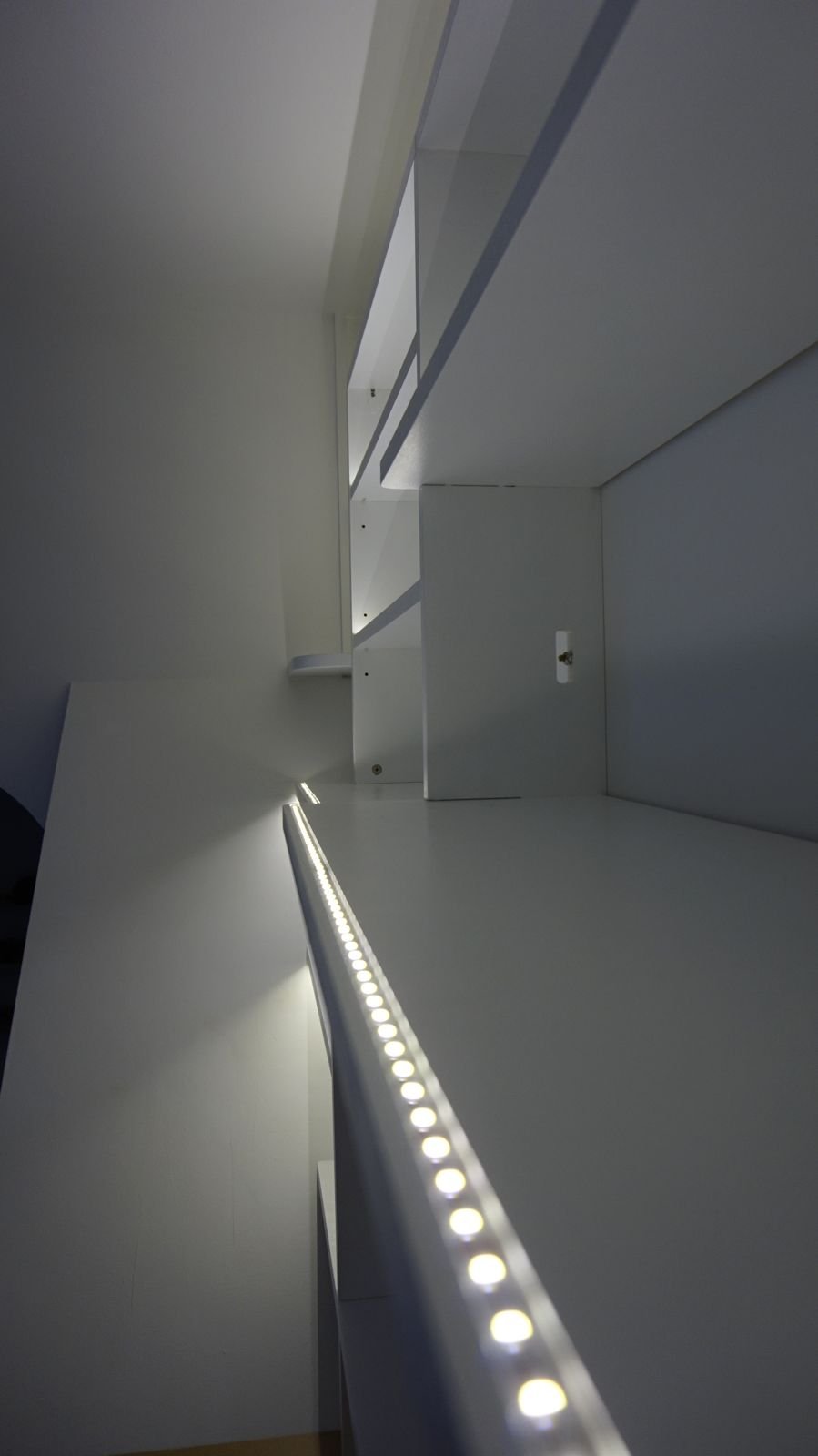Close-up of the LED strip under a shelf